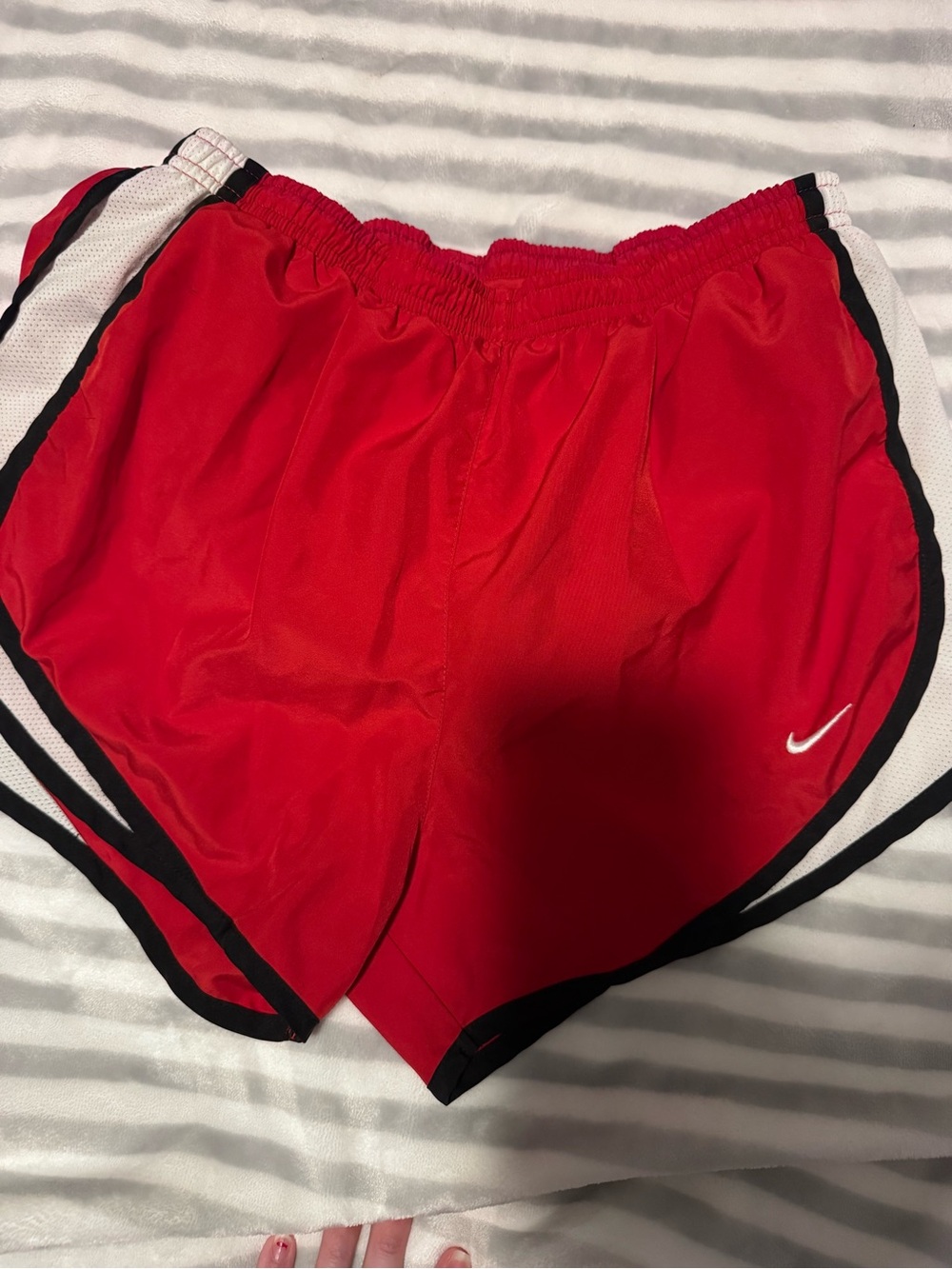 Nike Red Women's Athletic Shorts with Black Trim and White Swoosh